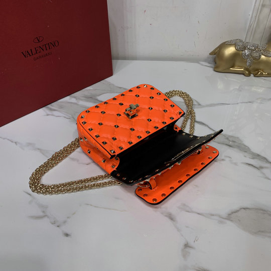 micro rockstud spike fluo calfskin leather bag