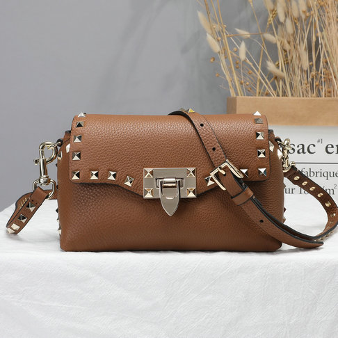 rockstud mini calfskin leather crossbody