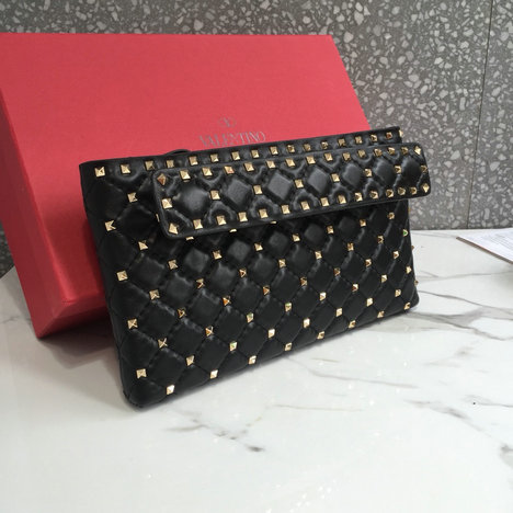 valentino rockstud spike clutch